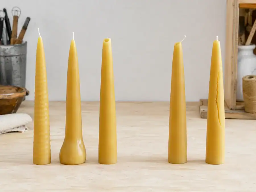 Taper candle defects and save or remake decisions